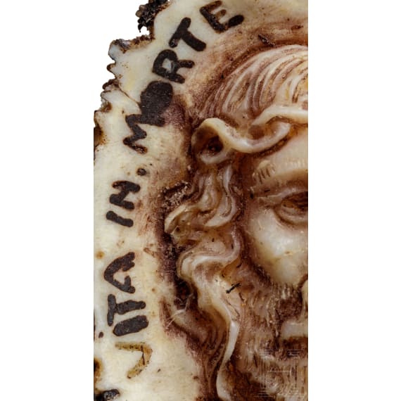A carved German deer amulet with Memento Mori head, 19th century