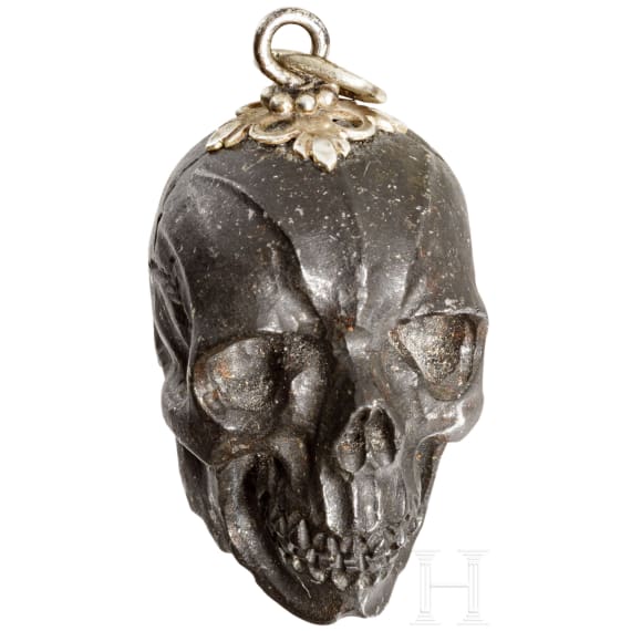 A German memento mori skull made from meteoric stone, 19th century