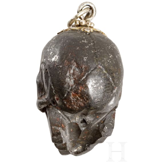 A German memento mori skull made from meteoric stone, 19th century
