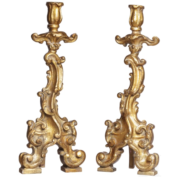 A pair of southern German gilt wooden candlesticks, mid 18th century