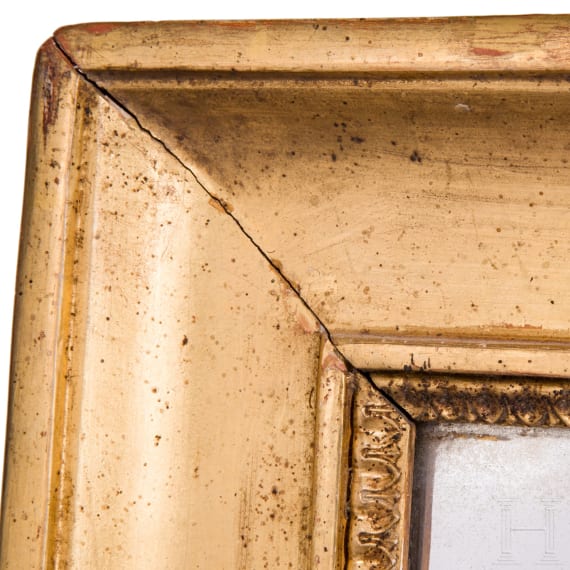 A large carved and originally gilded German neoclassical mirror, circa 1800