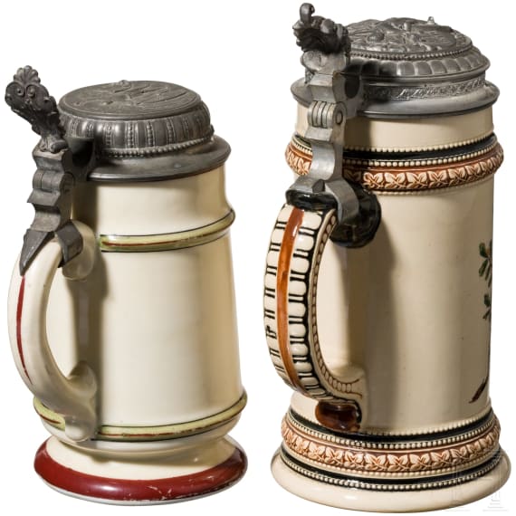 Two Hochrad-motif jugs, late 19th century