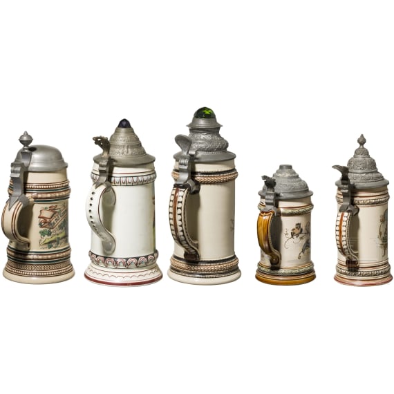 Five motif jugs with tin lids, around 1900