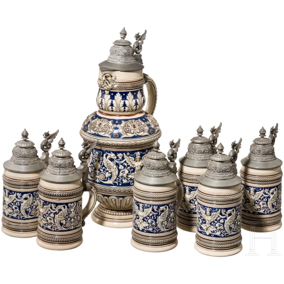 A lidded can with six beer mugs, short before 1900