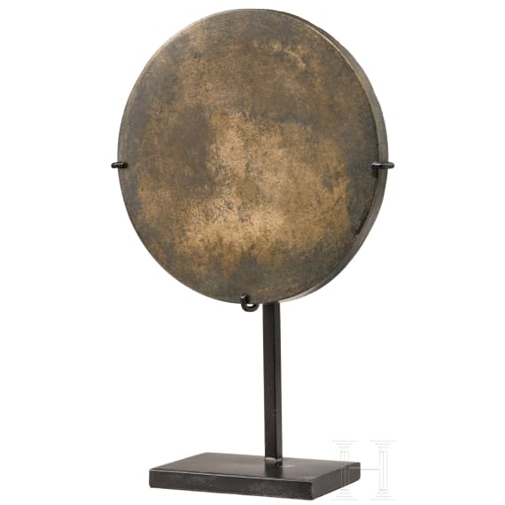 A Chinese bronze mirror, 18th/19th century