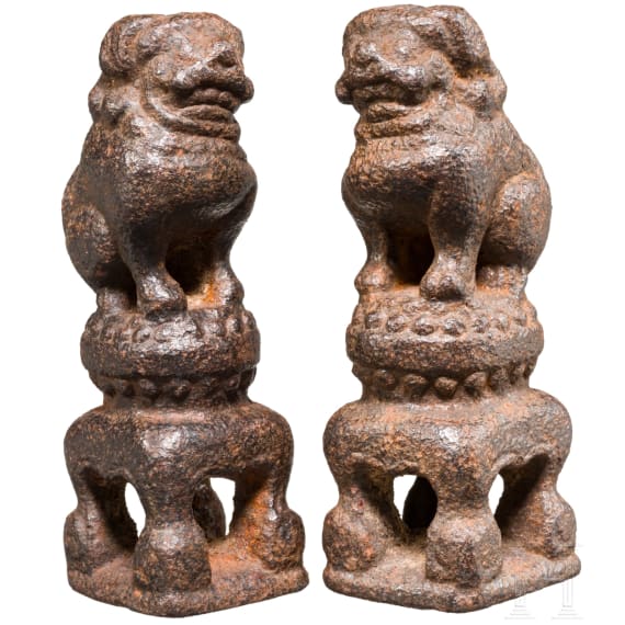 A pair of Chinese opium balance weights in the shape of Fo hounds, circa 1900