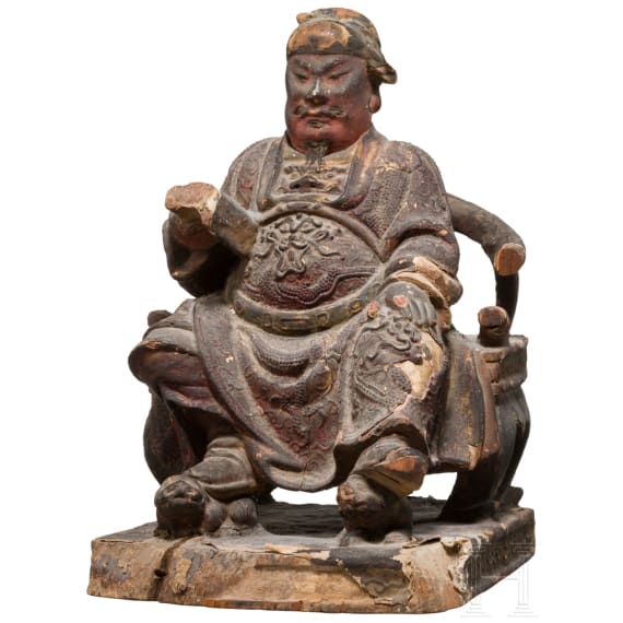 A Chinese carved and painted sculpture of a sitting scholar, 18th century
