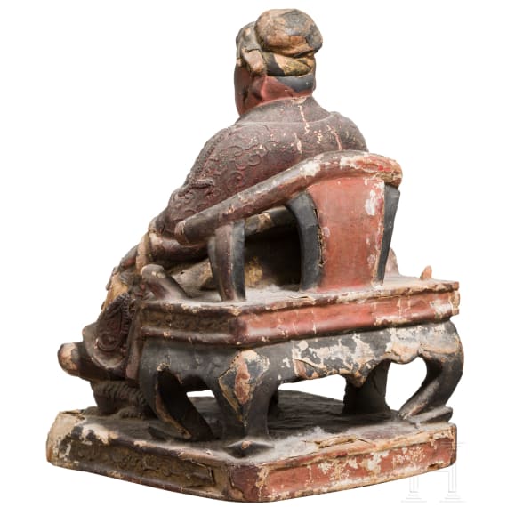 A Chinese carved and painted sculpture of a sitting scholar, 18th century