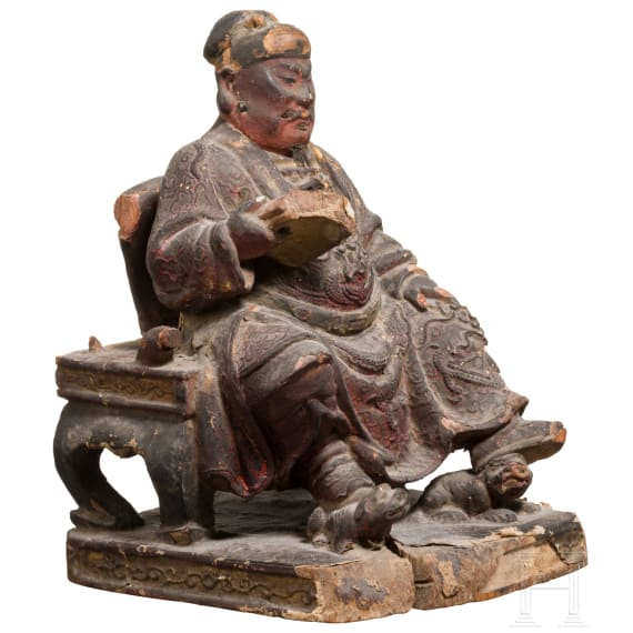 A Chinese carved and painted sculpture of a sitting scholar, 18th century