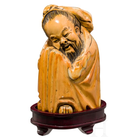 A Chinese figure of a wise man, circa 1900