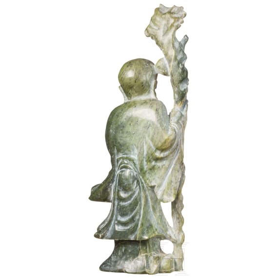 A figure of the god Shoulao in light green nephrite, 20th century