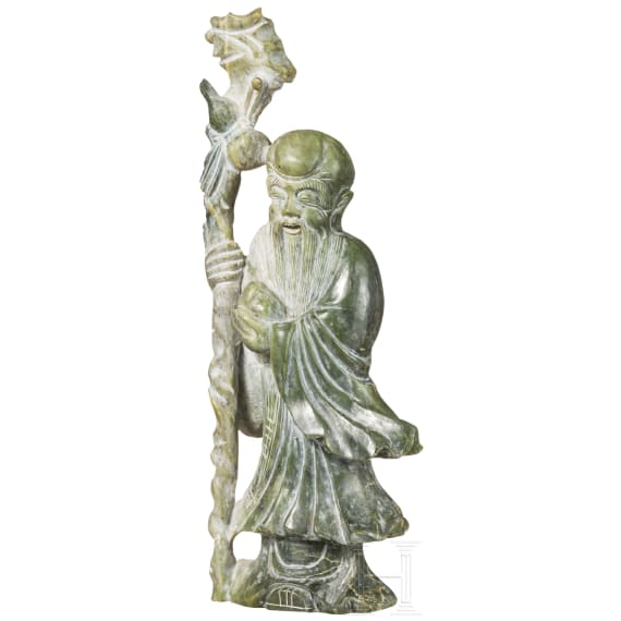 A figure of the god Shoulao in light green nephrite, 20th century