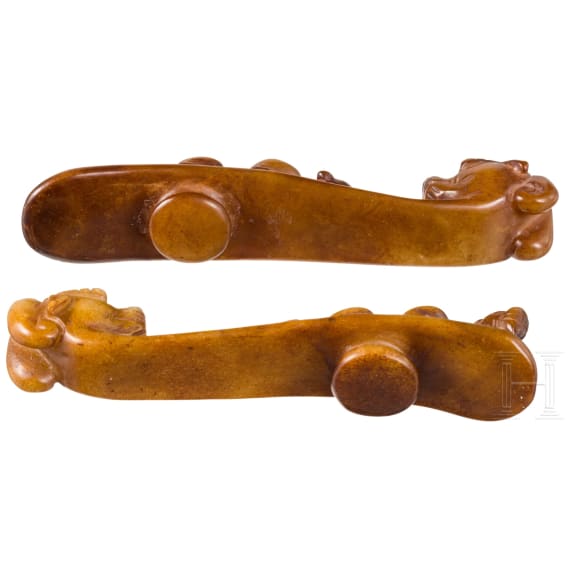 A pair of Chinese jade belt hooks, probably circa 1900 or earlier