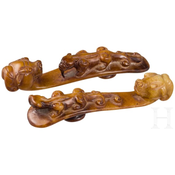A pair of Chinese jade belt hooks, probably circa 1900 or earlier