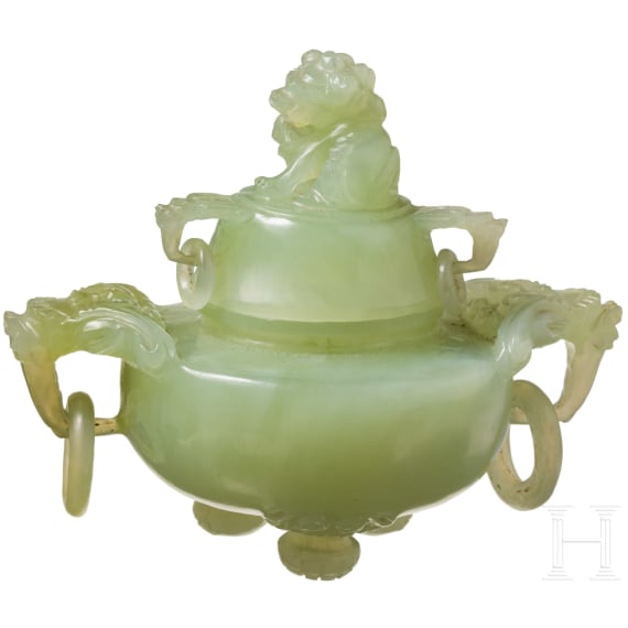 A Chinese lidded vessel in light green jade, late 19th/early 20th century