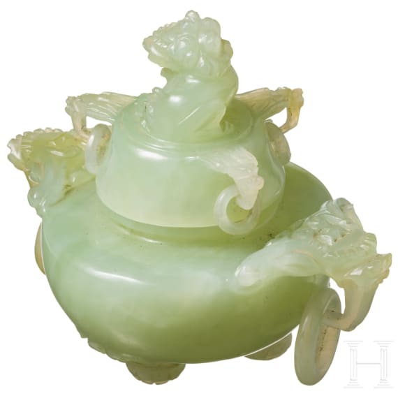 A Chinese lidded vessel in light green jade, late 19th/early 20th century