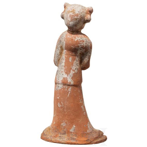 A ceramic figurine of a standing lady, China, Tang period