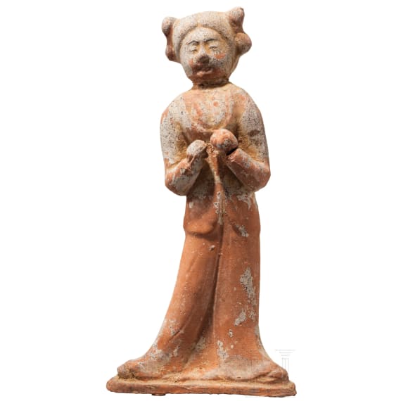 A ceramic figurine of a standing lady, China, Tang period
