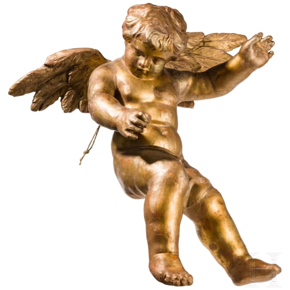 A carved and gold painted putto, German, 18th century