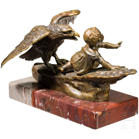 Ruffino Besserdich (1852 - ?) - a small bronze sculpture of a child with eagle