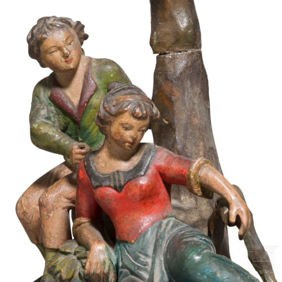 Two Tyrolean carvings with genre scenes as counterparts, circa 1800