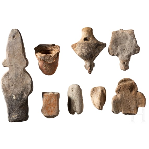 Seven small Central and South American figures and heads plus a clay pipe, circa 1st &ndash; 15th century