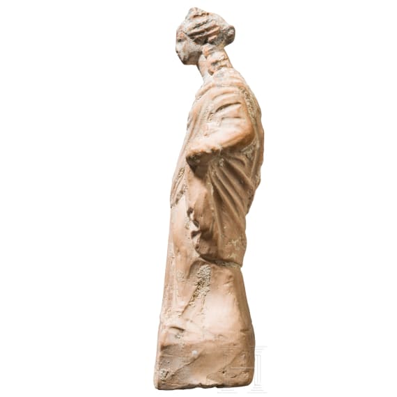 A Greek female terracotta statuette, Magna Graecia, 4th century B.C.