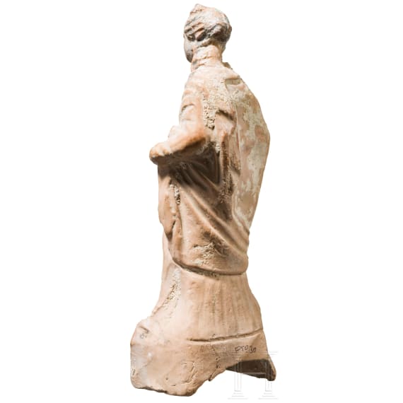A Greek female terracotta statuette, Magna Graecia, 4th century B.C.