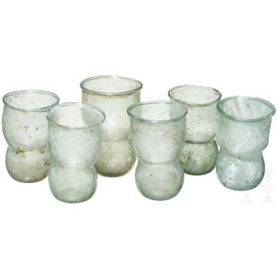 Six early Byzantine bulb shaped lamps of a poycandelion, 5th - 6th century