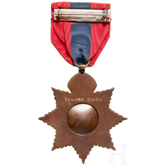 Great Britain - an Imperial Service Medal with document, dated 1913