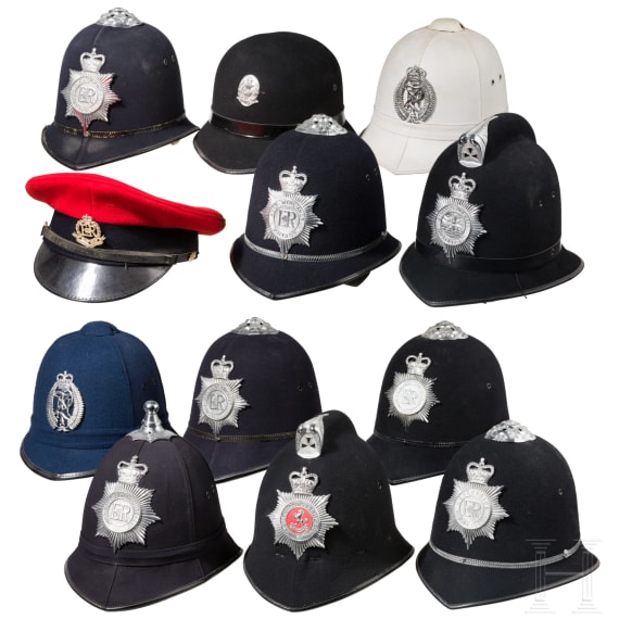 Zw&ouml;lf Polizei-Kopfbedeckungen, Gro&szlig;britannien/Neuseeland, 20. Jhdt.