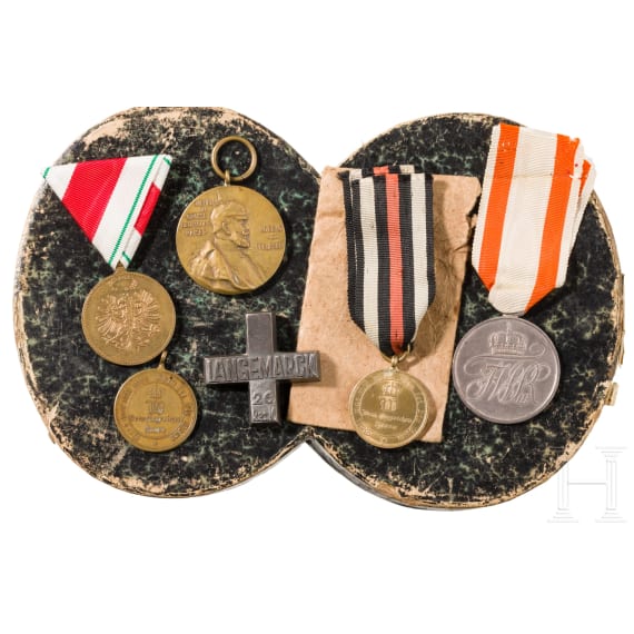 A collection of medals, insignias, documents, 19th/20th century