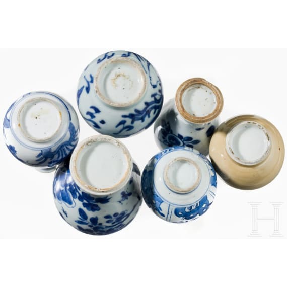 A set of six Chinese miniature vases on a stand, 18th/19th century