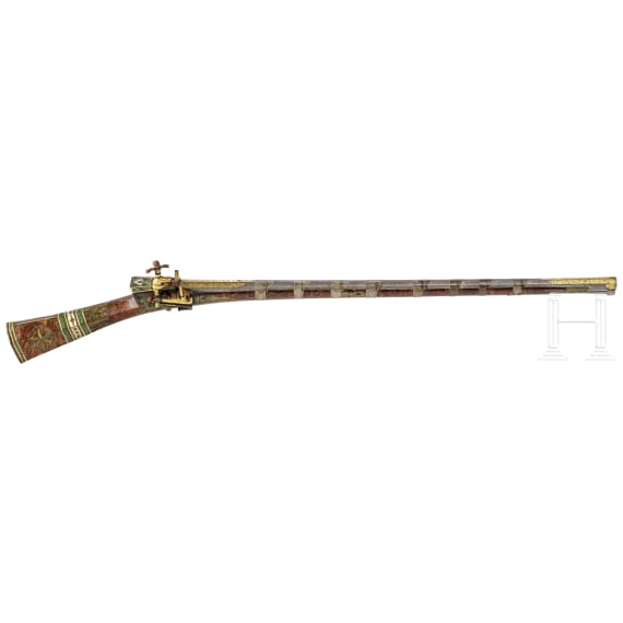 An Ottoman gold-inlaid miquelet-lock rifle (Tüfek) adorned with corals, mid-18th century