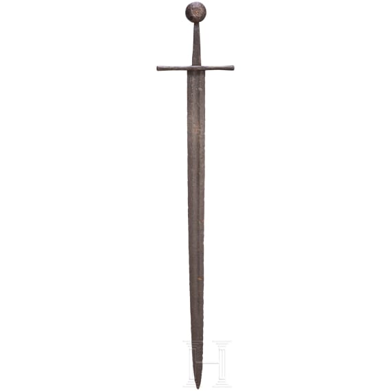A German sword with disc pommel, circa 1300