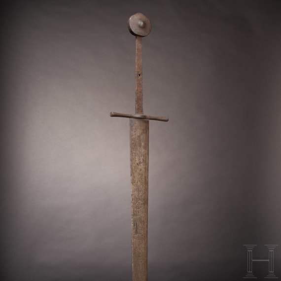 A rare German two-handed battle sword with heavy single-edged blade, circa 1350 – 1400
