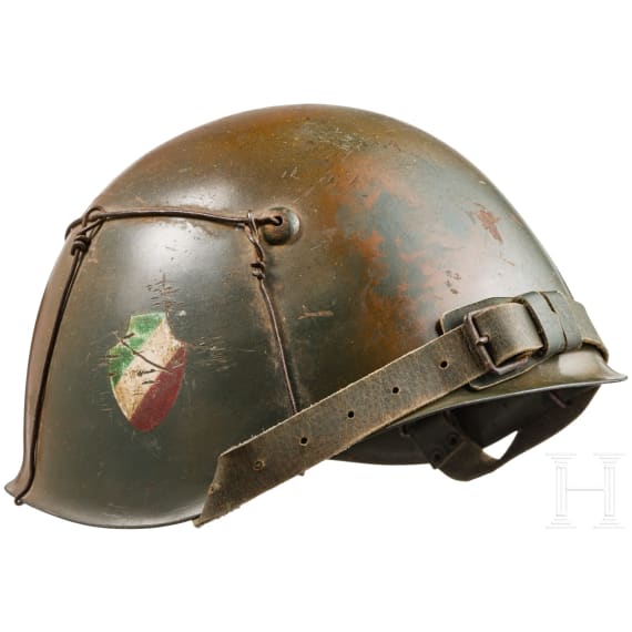 A camouflage steel helmet from the Division Italia, circa 1943