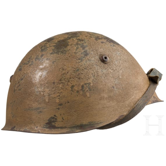 A steel helmet M 34 in tropical camouflage