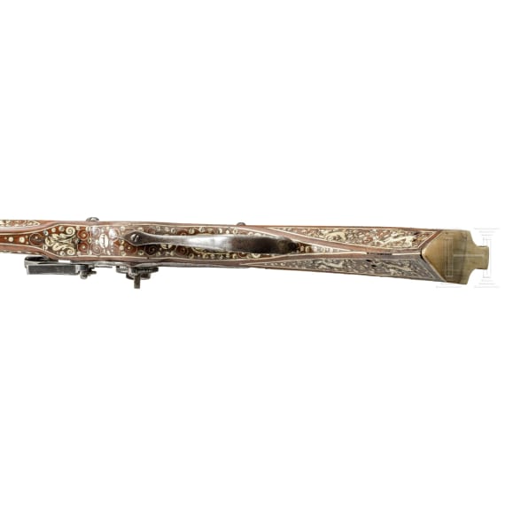 A profusely bone-inlaid wheel-lock arquebus, Teschen, circa 1650
