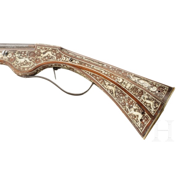 A profusely bone-inlaid wheel-lock arquebus, Teschen, circa 1650