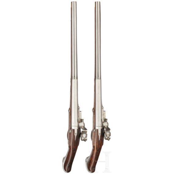 A rare pair of flintlock holster pistols made for superimposed loads, from the armoury of the Princes of Salm-Reifferscheidt-Dyck, northern German or Dutch, circa 1660