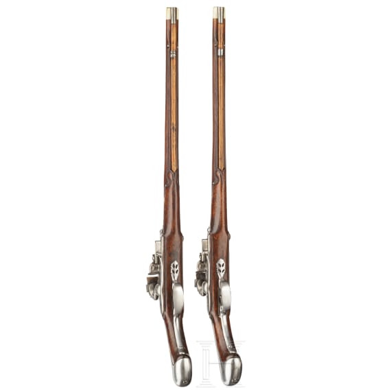 A rare pair of flintlock holster pistols made for superimposed loads, from the armoury of the Princes of Salm-Reifferscheidt-Dyck, northern German or Dutch, circa 1660