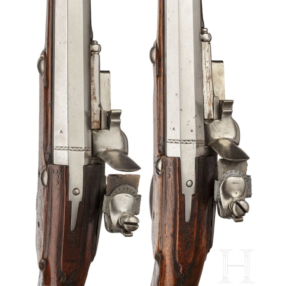 A rare pair of flintlock holster pistols made for superimposed loads, from the armoury of the Princes of Salm-Reifferscheidt-Dyck, northern German or Dutch, circa 1660