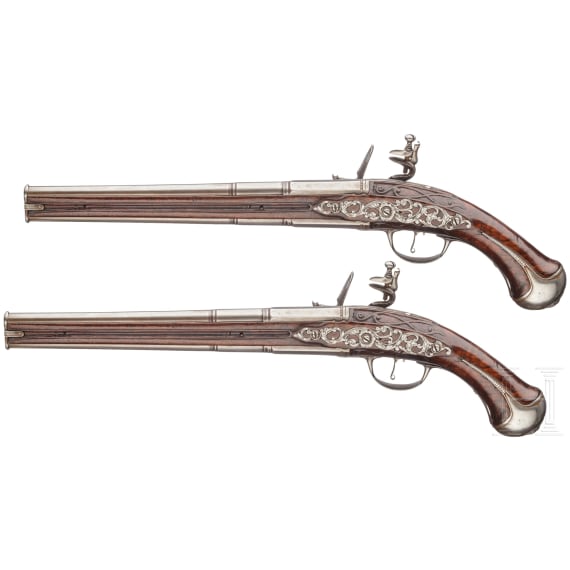 A pair of German over-and-under flintlock pistols, circa 1690/1700