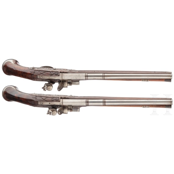 A pair of German over-and-under flintlock pistols, circa 1690/1700