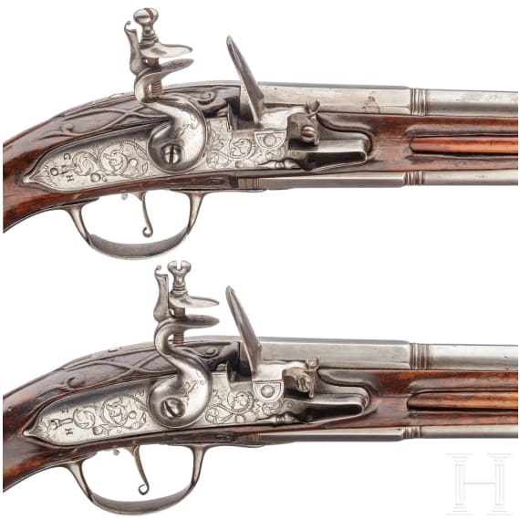 A pair of German over-and-under flintlock pistols, circa 1690/1700