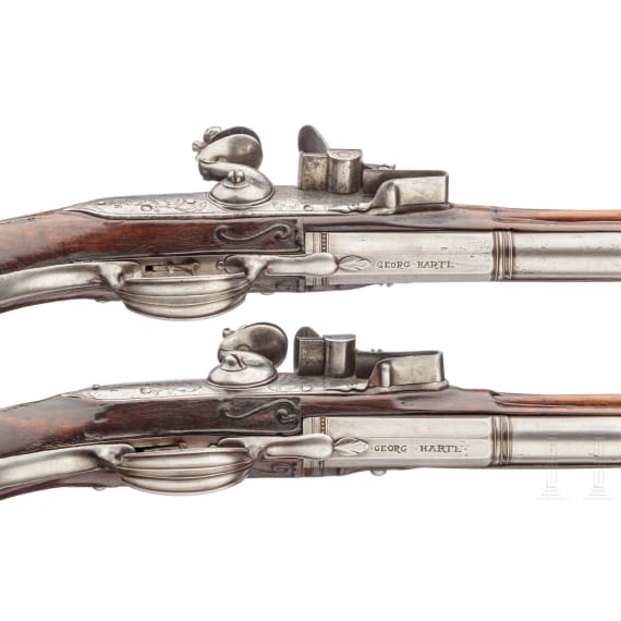 A pair of German over-and-under flintlock pistols, circa 1690/1700