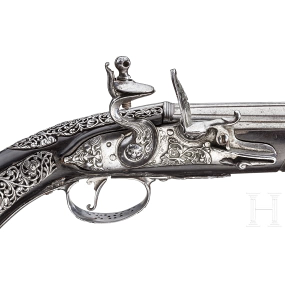 A chiselled flintlock pistol, Brescia, late 17th century