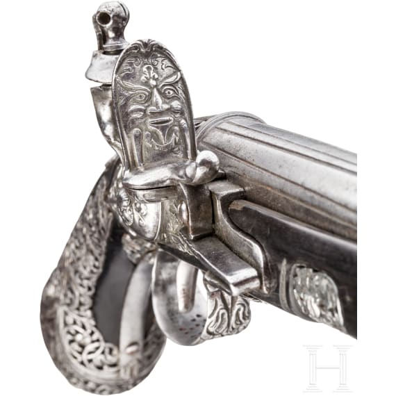 A chiselled flintlock pistol, Brescia, late 17th century