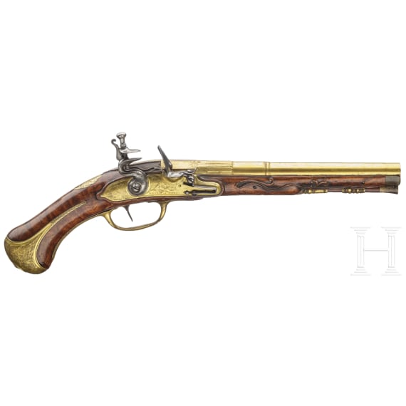 A splendid fire-gilt flintlock pistol by Jean Brion &agrave; Paris, circa 1710